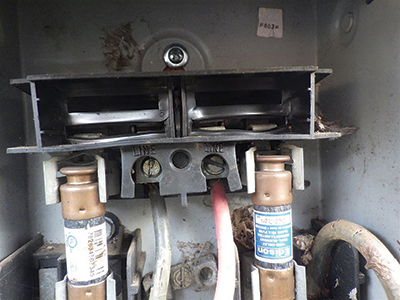 Figure 4: Melted disconnect on condensing unit; courtesy of Jim Katen